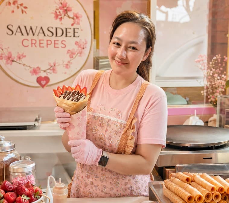 A small business owner at work in her crepe shop